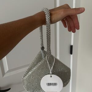 NWT Silver  rhinestone wrist evening bag. Selfie Leslie